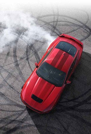 Overhead view of a 2024 Ford Mustang® model with tire tracks on pavement | Paoli Ford in Paoli PA